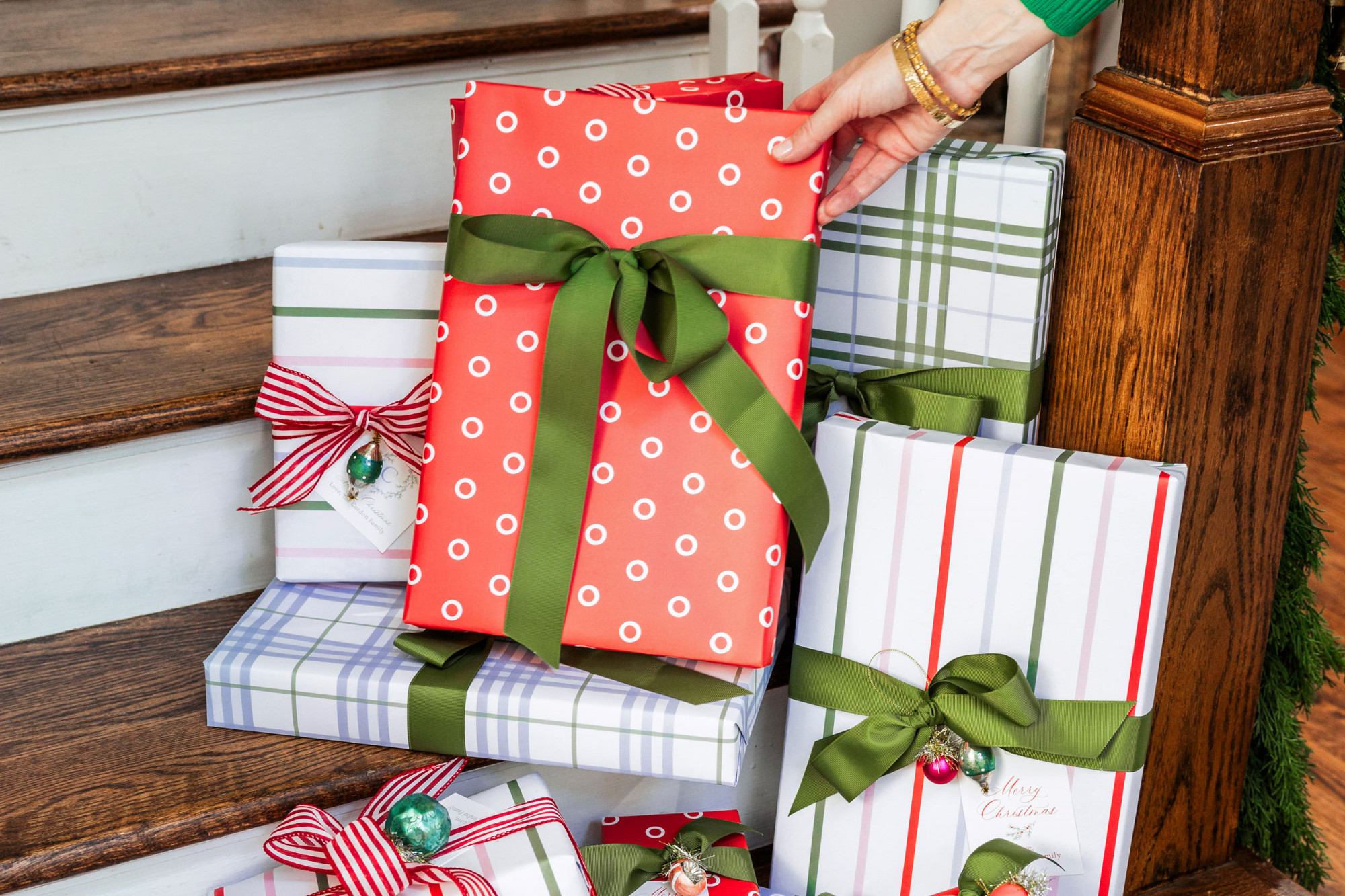 Gifts wrapped in Joy Creative Shop x DoSayGive Wrapping Paper